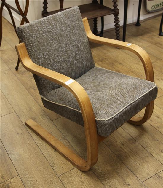 An Alvar Aalto bentwood cantilever armchair, model 402 possibly for Finmar, stamped Made in Finland